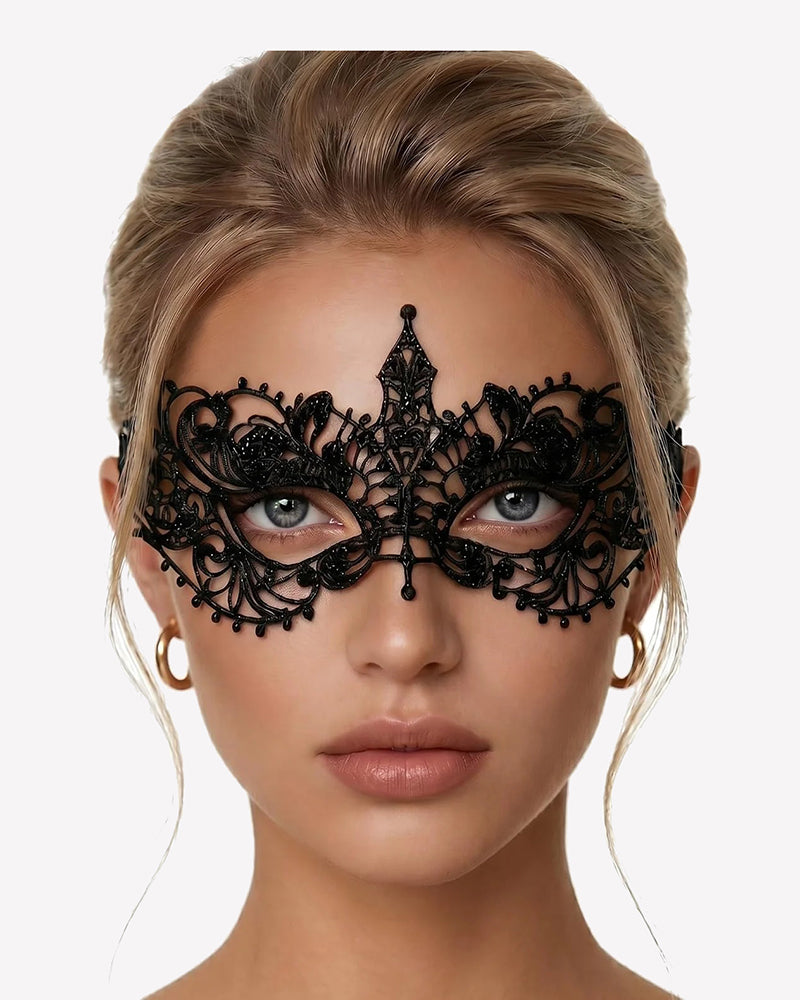 Black lace masquerade eye mask with symmetrical crown-like filigree detail