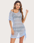 Light blue lace swimwear cover-up tunic with short sleeves, zigzag pattern, and side ties