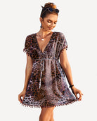 Leopard print swimsuit cover-up dress with V-neck and pom-pom tassel trim