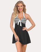 Halter black swimdress with black-and-white striped bust and center tie