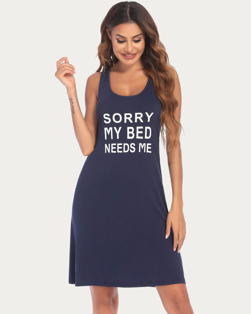 Navy blue racerback night dress with sleeveless scoop neck, “Sorry My Bed Needs Me” print.