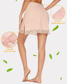 Beige half slip skirt with lace hem, elastic waistband, and side slit