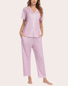 Notch collar soft pajama set in light pink tiny dot print, button-front top and tapered long pants