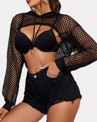 Black fishnet mesh hoodie crop top with drawstring hood and long sleeves
