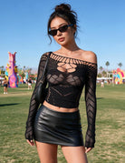 Black fishnet long-sleeve mesh top with wide scoop neck and cut-out chest design