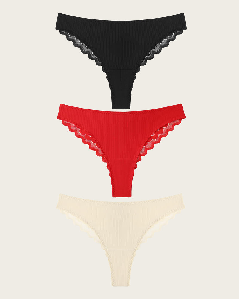 Three-pack lace hipster no-show panties: black, red, and beige, scalloped lace trim.