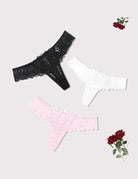 Lace thong set with scalloped trim and cross-back design; black, white, pink.