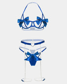 Blue bow bra and panty set flat lay with heart belt and chain garters