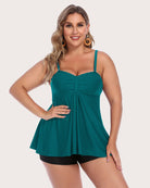 Teal tankini top with bust detail and matching black swim shorts