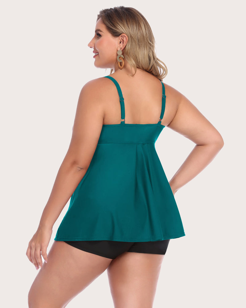Teal tankini top with strappy back and matching black swim shorts