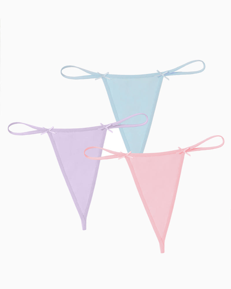 Three G-string thongs: light blue, lavender, and pink
