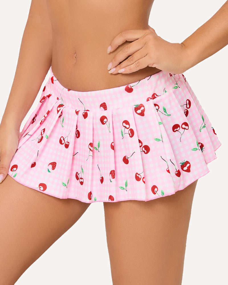 Pleated ruffle mini skirt in pink with red cherry print and layered pleats