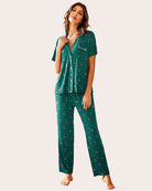 Women's green dot pajama set with notch collar, short-sleeve button top and long pants.