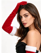 Long red velvet glove with white cuff, shown on a model