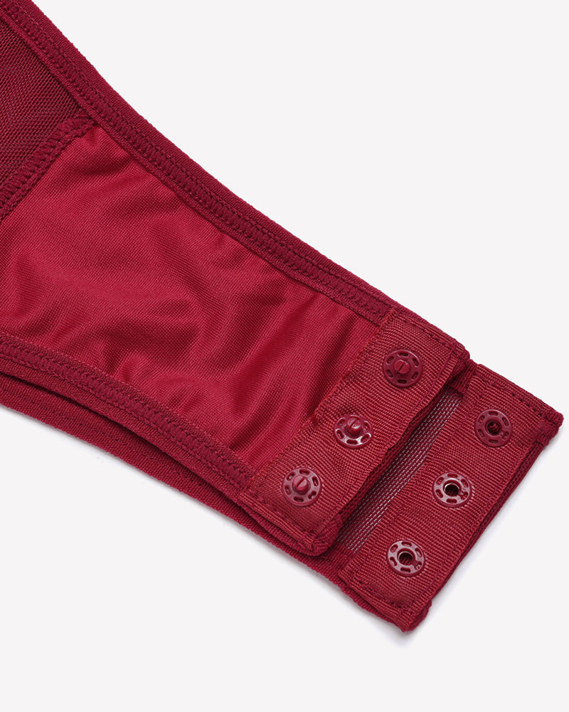 Wine red lace bodysuit sleeve cuff close-up with small button detailing
