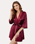 Wine red satin kimono robe with lace V neckline, belted waist, and wide sleeves