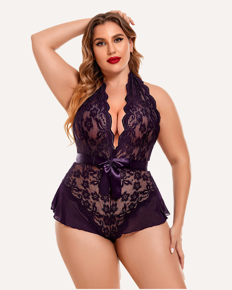 Dark lace halter bodysuit with plunging V-neck and satin ribbon bow at waist