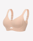 Nude wireless push-up bralette bra from side, with adjustable straps and center cutout.