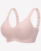 Seamless wireless push-up bra in salmon pink, smooth molded cups, adjustable straps