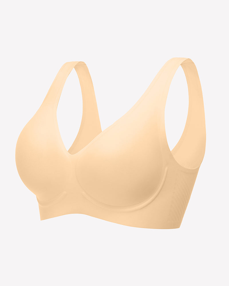 Nude-beige seamless V-neck bralette with full-coverage cups and smooth, seam-free fit.