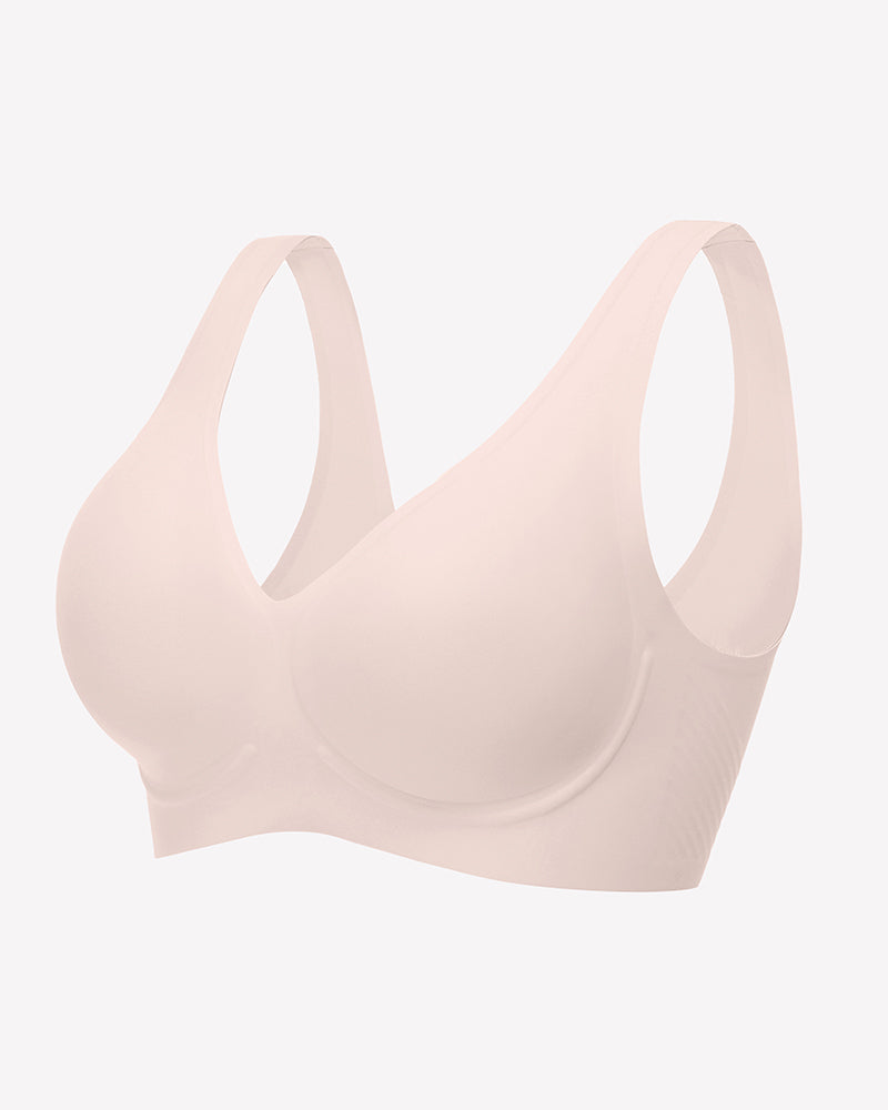 Soft pink seamless V-neck bralette with full-coverage cups and smooth, seam-free finish.