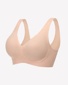 Light pink seamless V-neck bralette with full-coverage cups and smooth, seam-free finish.