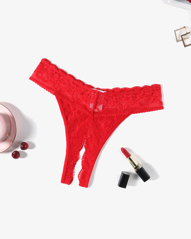Red lace t-back thong with scalloped edges, laid flat
