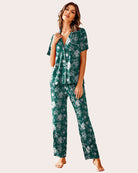 Notch collar soft pajama set in dark green floral print, short-sleeve top and matching long pants