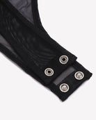 Black mesh bodysuit cuff with snap-button details