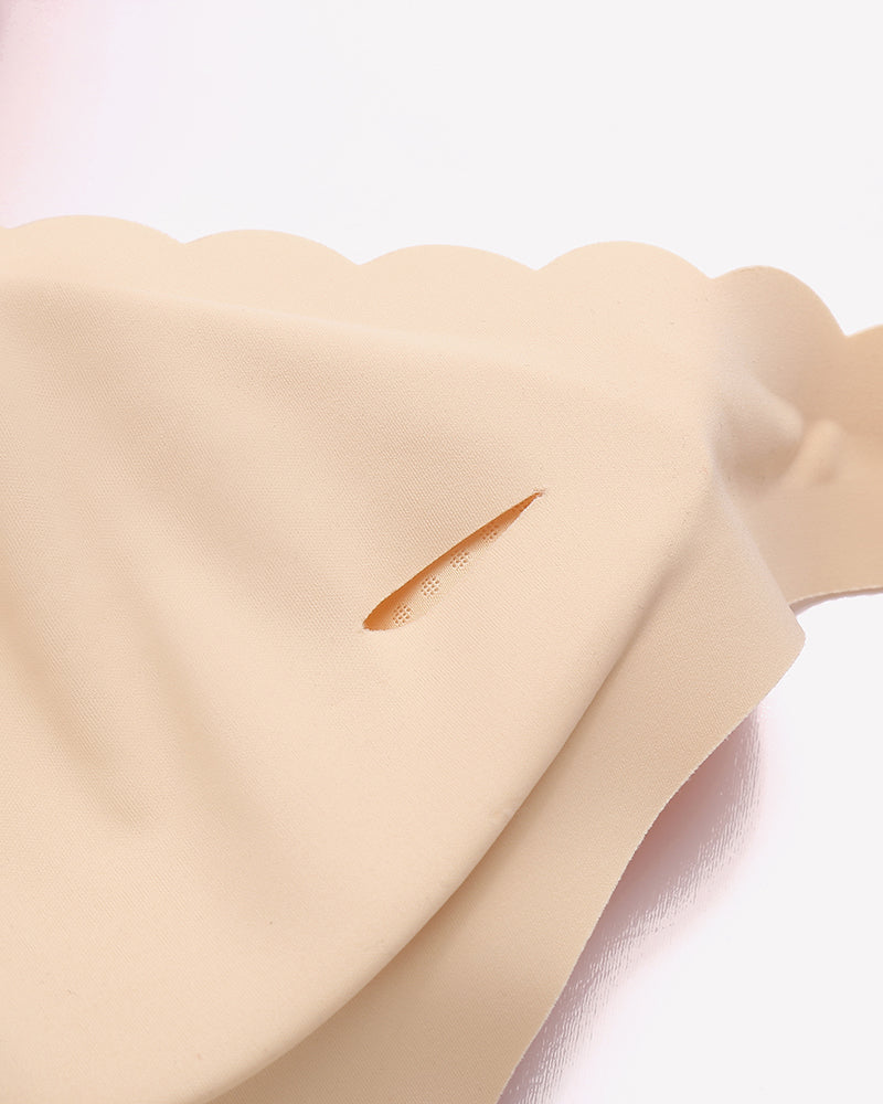 Wireless V-neck seamless full-coverage bra, nude, smooth seamless fabric close-up