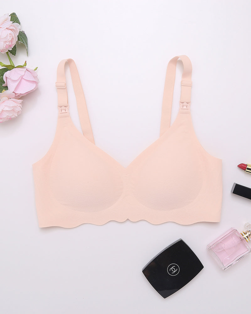 Seamless ultra maternity bra in light apricot, flat lay with adjustable straps