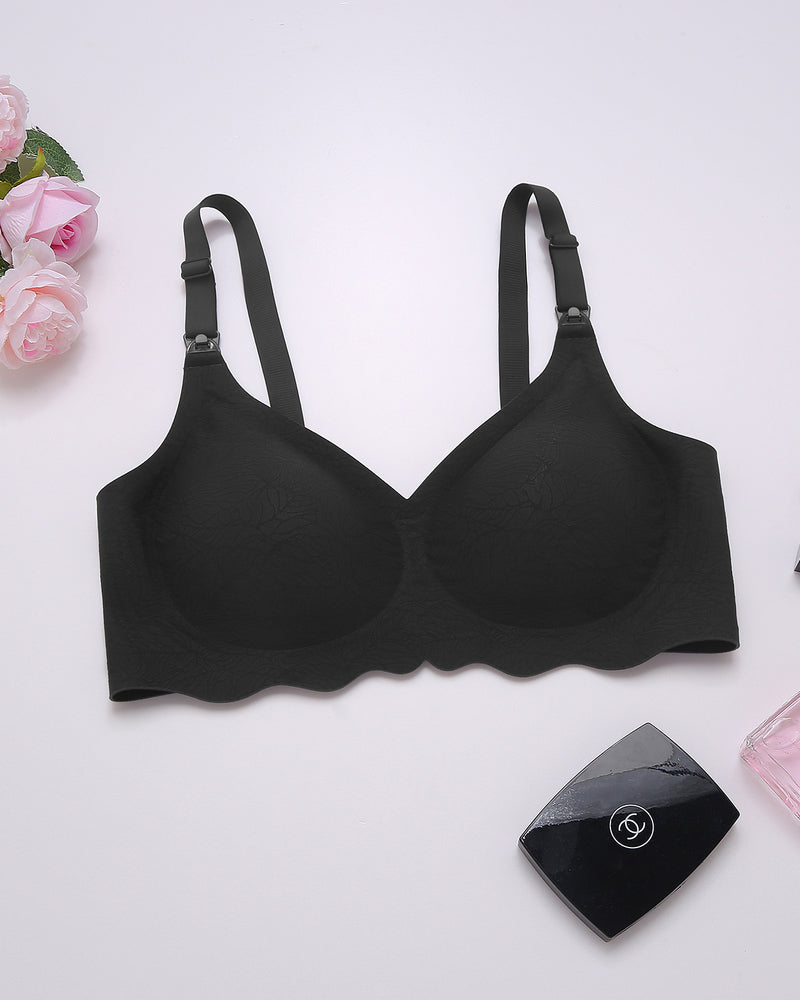 Two black seamless maternity bras with adjustable straps, flat-lay product view