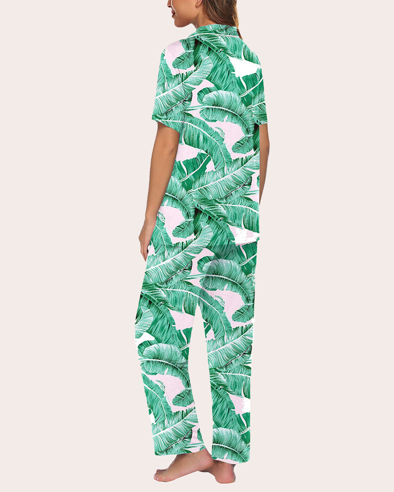 Green tropical leaf pajama set with short-sleeve top and long pants, all-over print