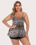Two-piece tankini set with leopard-print tankini top and black swim shorts