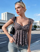 Leopard print sheer mesh top with gathered bust, flutter sleeves, and layered hem