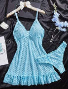 Light blue sheer chiffon babydoll with black dots, bow detail, ruffle hem, and matching G-string