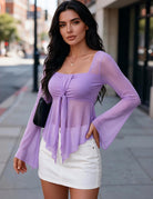 Lilac sheer chiffon top with square neckline, long flared sleeves, and tie front