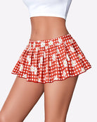 Red gingham ruffle pleated mini skirt with daisy print