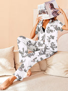 Cotton pajama set with long shirt and pants, white with dark dinosaur print