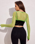 Neon green fishnet long sleeve crop top shown from back
