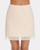 Light beige above-knee half slip skirt with lace trim hem and elastic waist