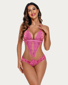 Pink lace mini bodysuit with deep V neckline, scalloped lace cups, thong bottom