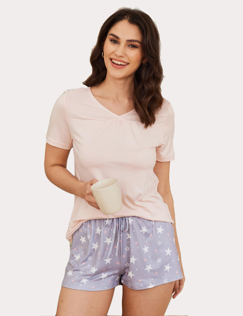 Cream pajama set with short-sleeve V-neck top and lavender star print shorts