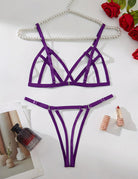 Purple strappy bra and thong set with geometric cup straps