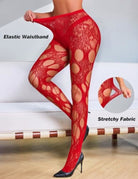 Red floral lace fishnet tights stretched at the waistband, showing large cutouts