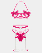 Pink bow bra and thong panty set with ribbon bows, heart choker, and chain garters