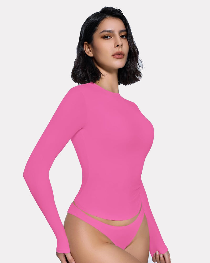 Pink long-sleeve crew-neck top with thong back underwear, rear view