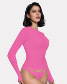 Pink long-sleeve crew-neck top with thong back underwear, rear view