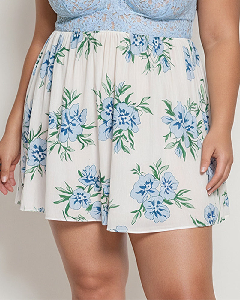 Floral babydoll skirt with gathered empire waist and blue flower pattern