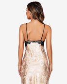 Back view: champagne jacquard slip dress with black lace trim and thin spaghetti straps